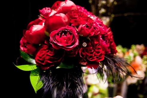 bright red flower feather bridal bouquet